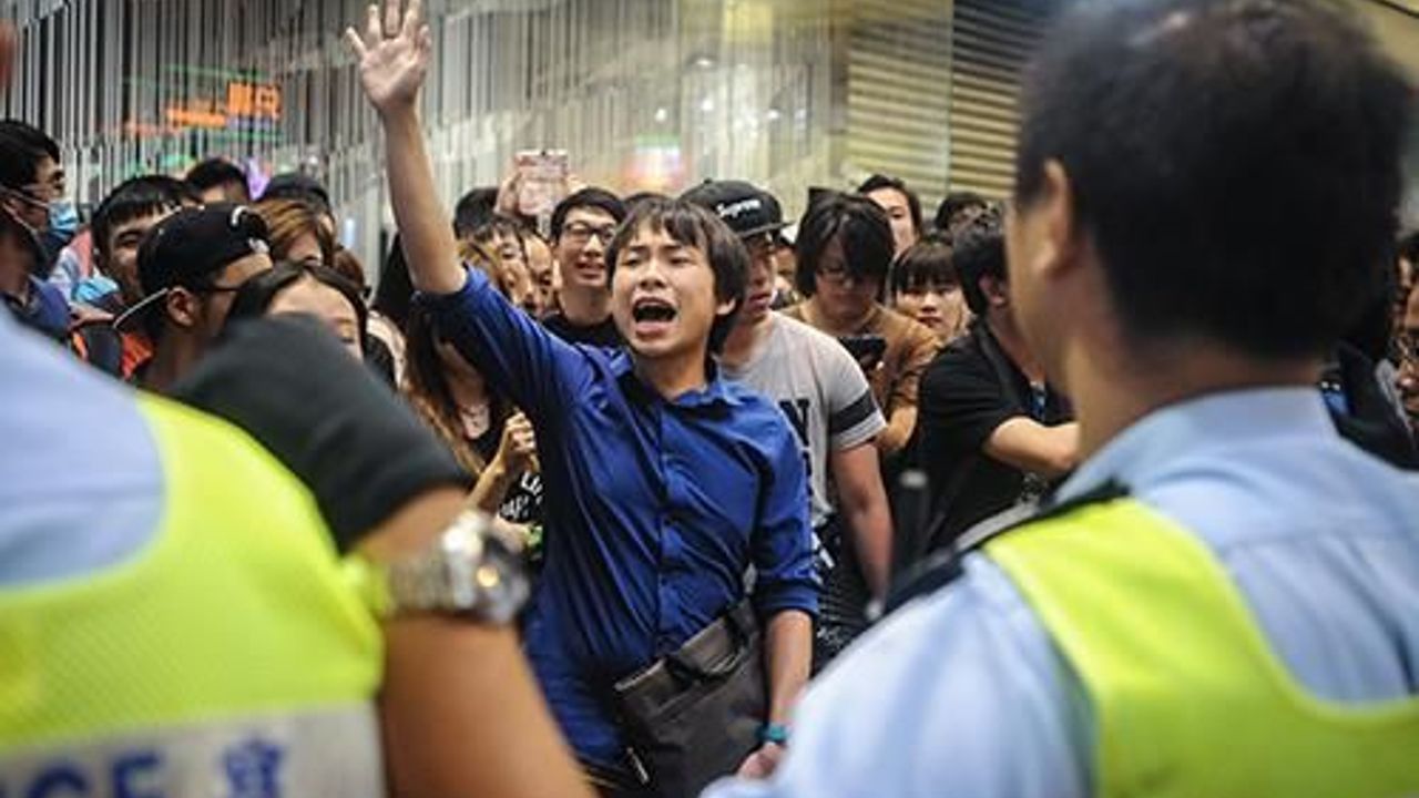 Calm returns to Hong Kong protest site after overnight scuffles