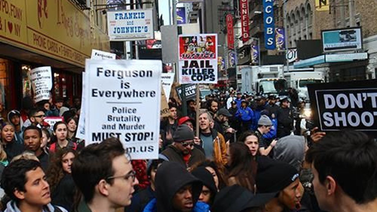 Protesters across US walk out in solidarity with Ferguson