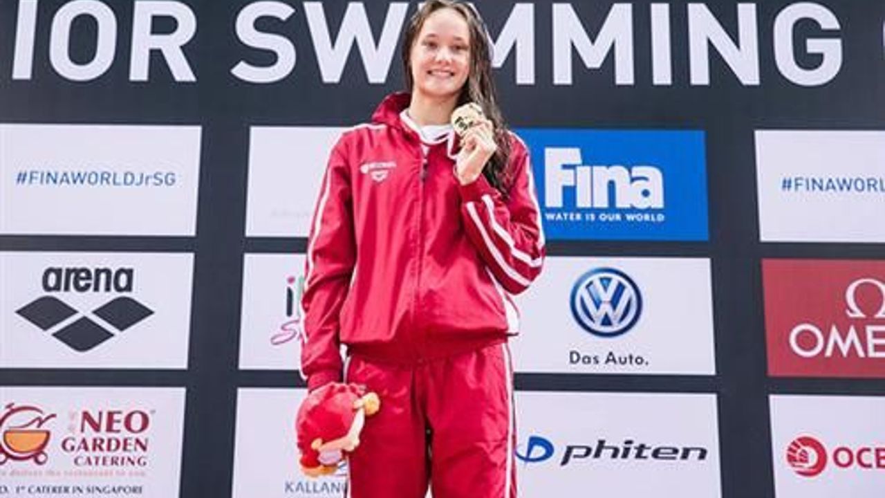Viktoria Zeynep Gunes brings first womens gold medal to Turkey in swimming.