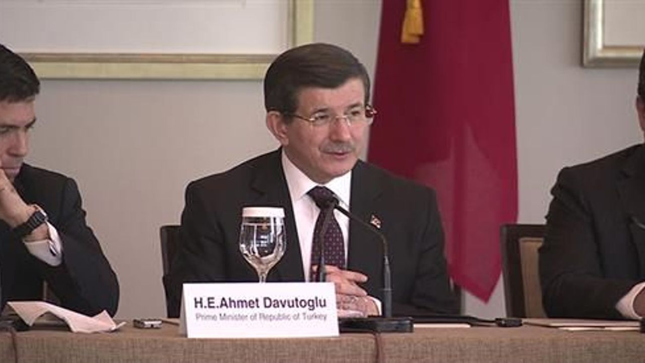 Turkish PM Davutoglu reassures investors on stability