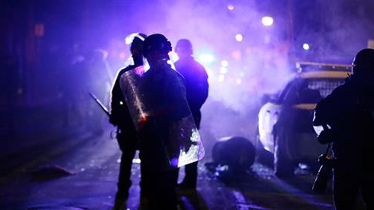 US Justice Department clears Ferguson officer in fatal shooting