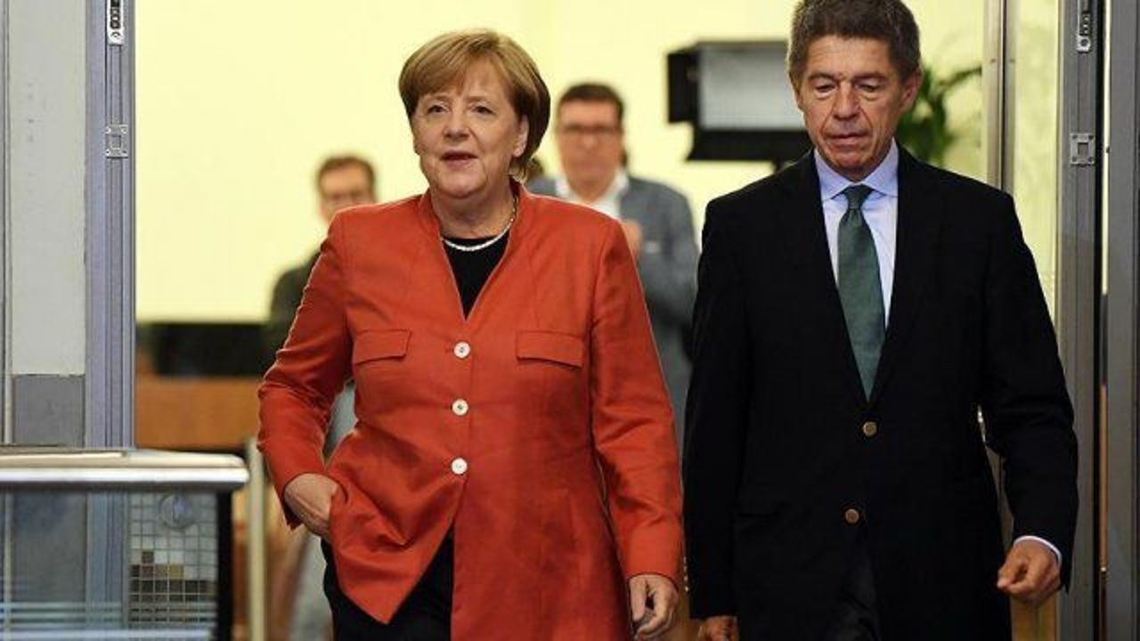 Merkel bloc wins election but faces far-right challenge