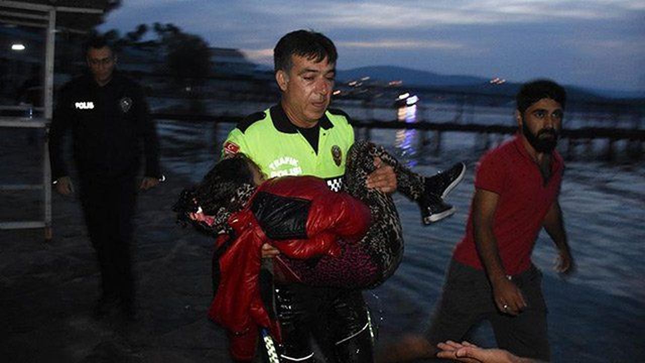 Turkish cop cries for migrant child fighting for life