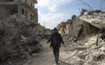 Assad forces bombarded the quake-hit zone